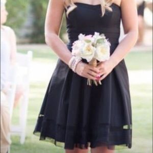 Classic black cocktail dress.